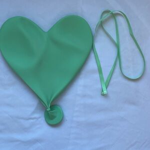 CJ Hendry deflated heart sculpture in Mint Green